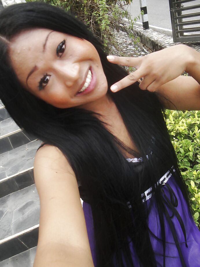 16P Cute small tit Thai ladyboy Kem posing in high heels and stroking her cock