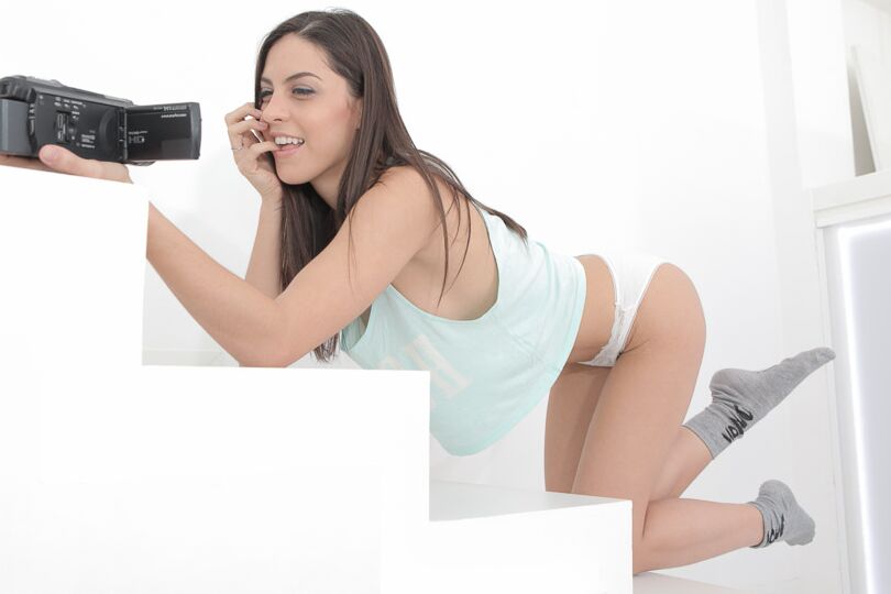 12P Amateur Latina model Carolina Abril taking self shots of bare tits and ass