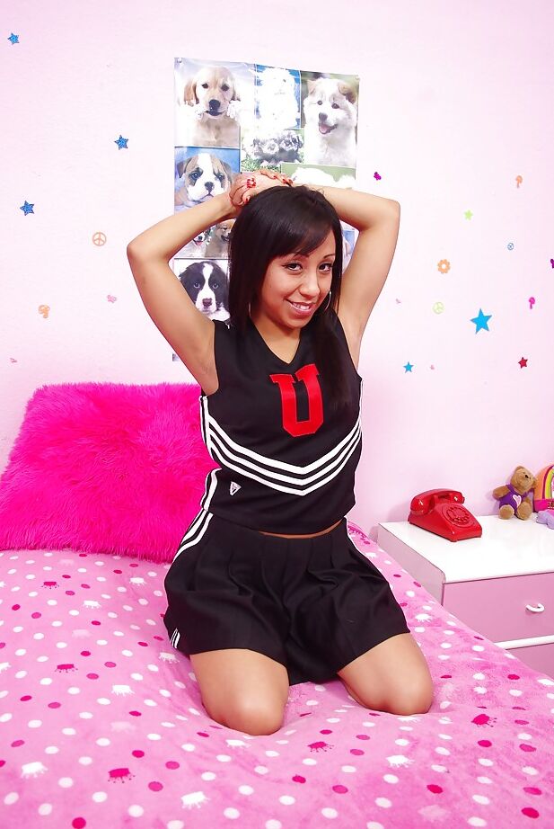 16P Filthy latina cheerleader Leslie Sierra slipping off her uniform
