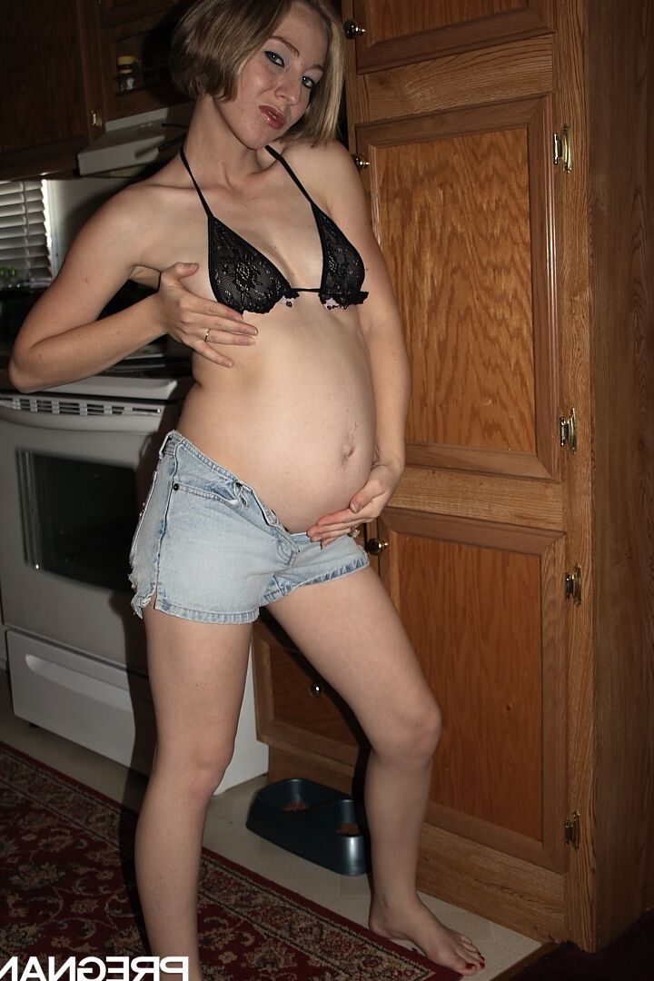 16P Heavily pregnant girl doffs bikini top and denim shorts to model totally naked