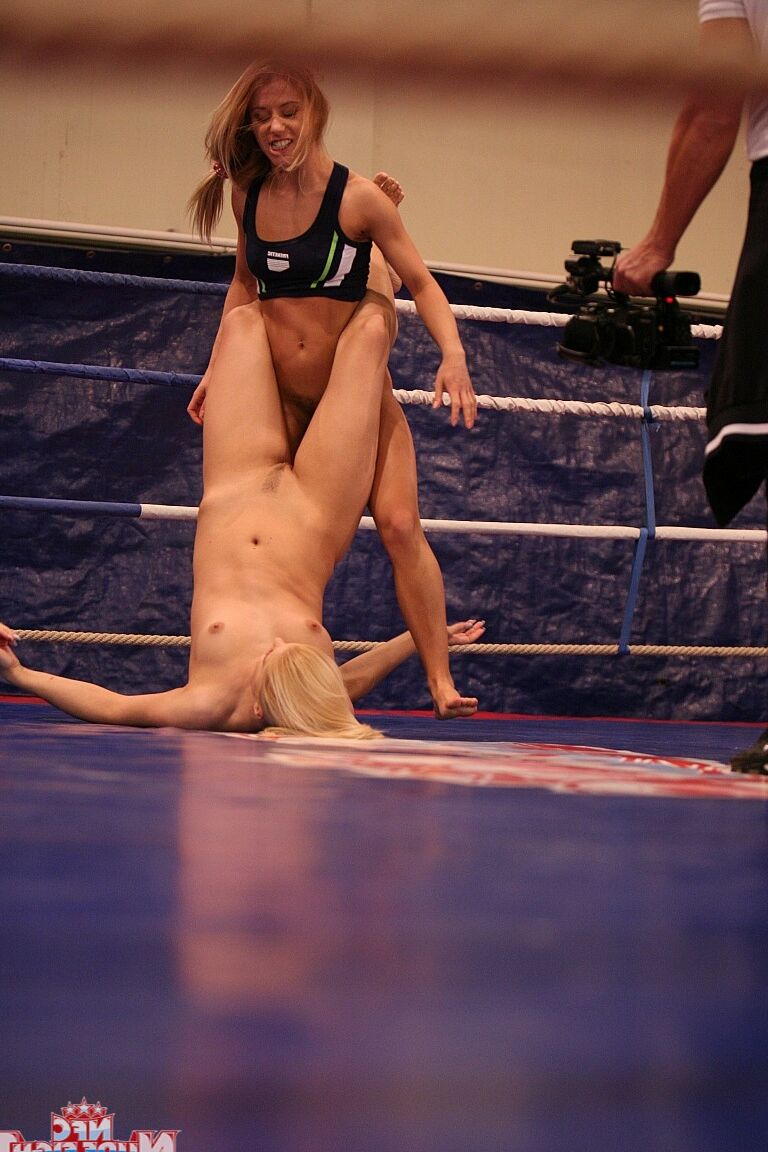 17P Blonde fighters with tiny tits grapple naked & wet their bodies in the ring
