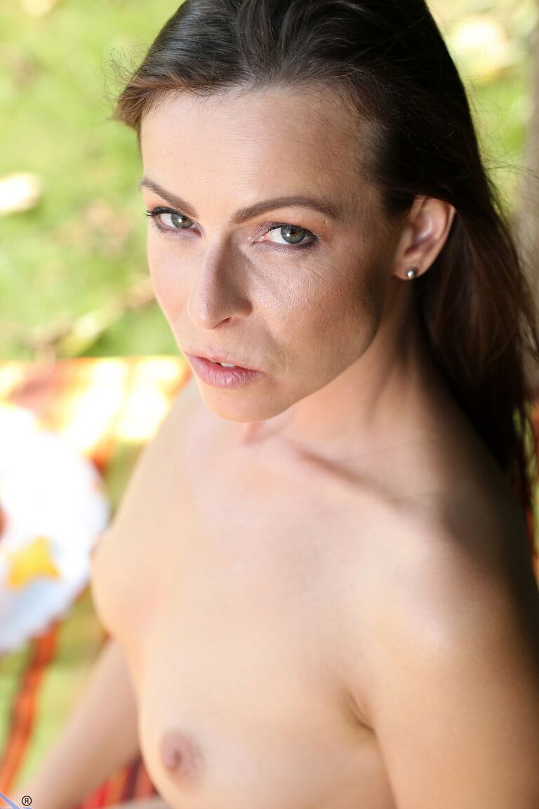 17P Slim brunette girl Caroline Ardolino folds back her labia lips on a blanket