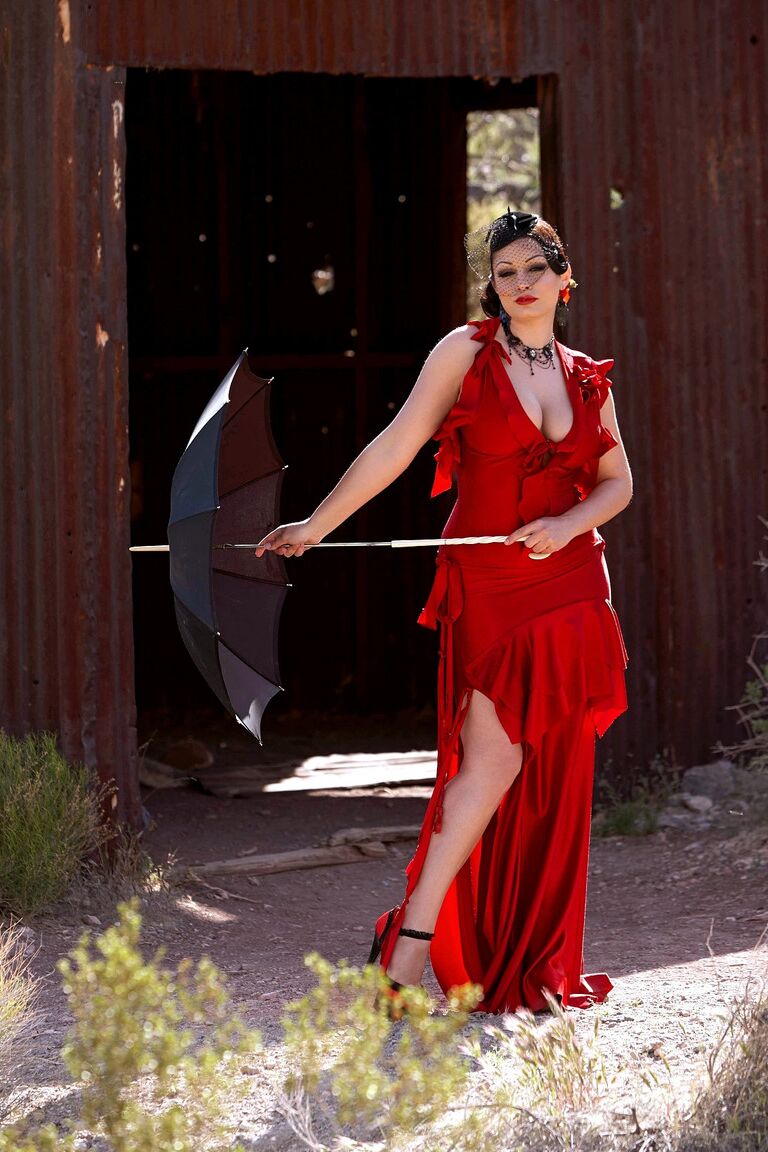17P Centerfold model Aria Giovanni puts away her parasol and whips out nice melons