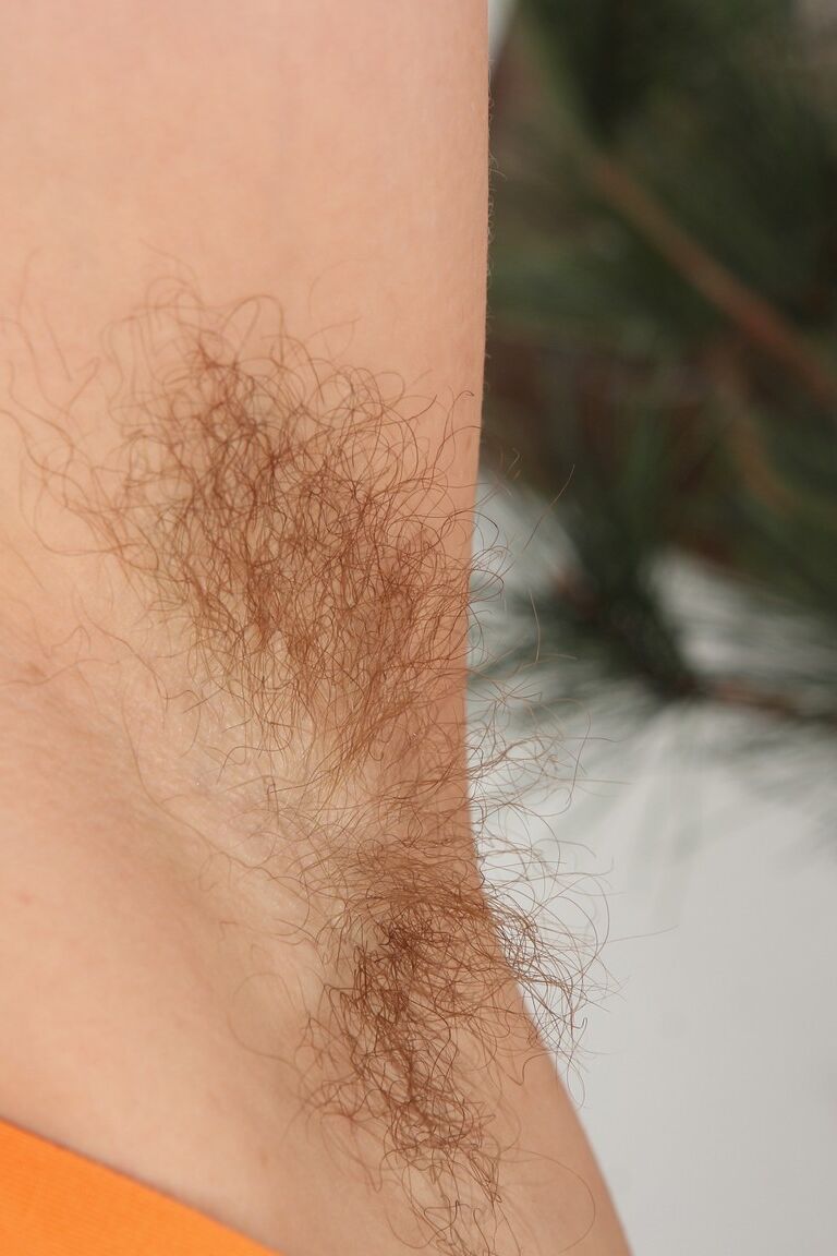 21P Mature wife Rosetta flaunts her hairy armpits and her twat in leather boots