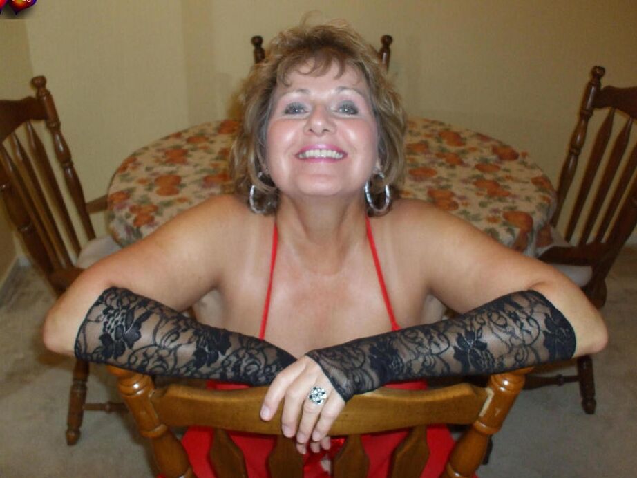 20P Mature lady Busty Bliss gets banged in crotchless stockings POV style