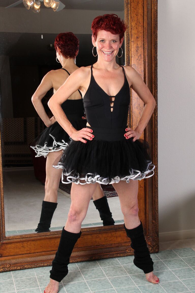 21P Mature redhead ballerina Suzy Stanton strips and masturbates on the floor