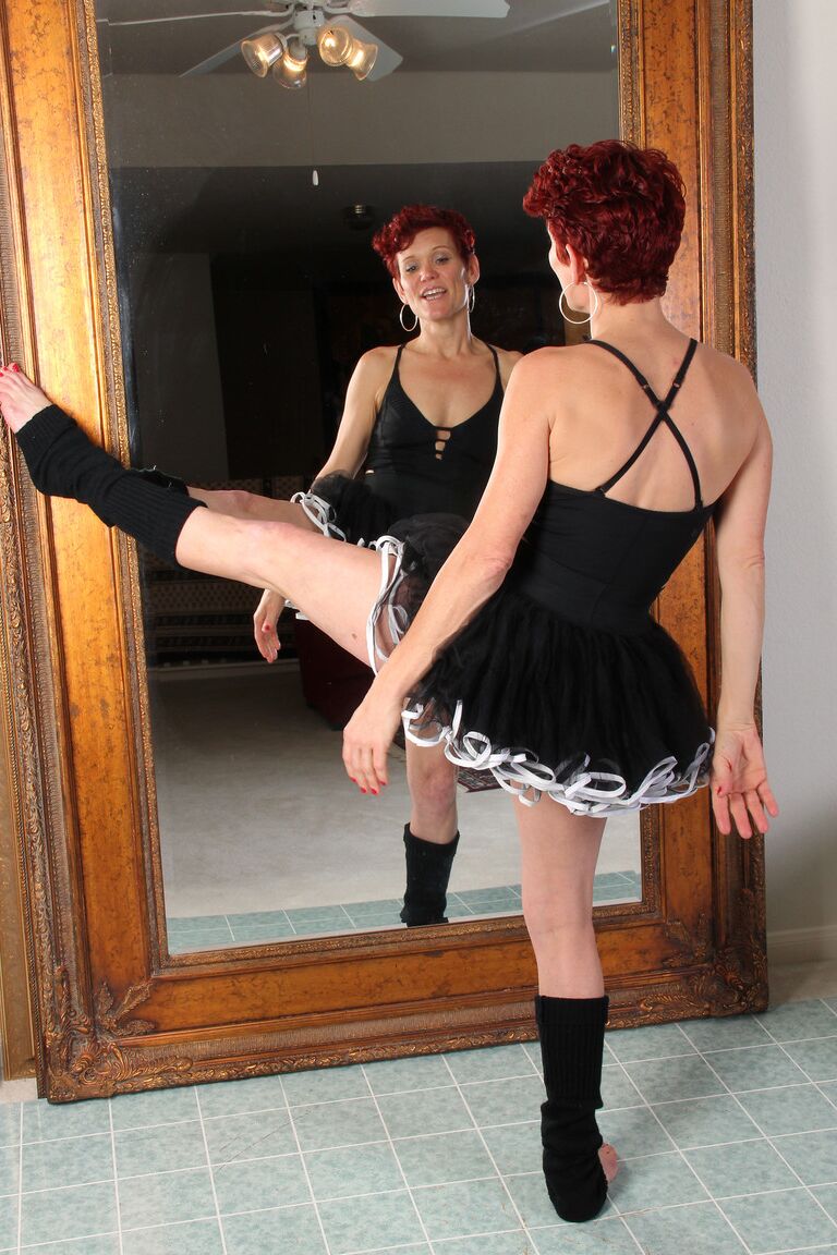 21P Mature redhead ballerina Suzy Stanton strips and masturbates on the floor