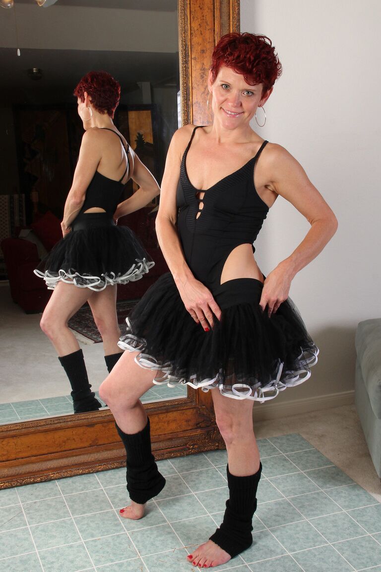 21P Mature redhead ballerina Suzy Stanton strips and masturbates on the floor