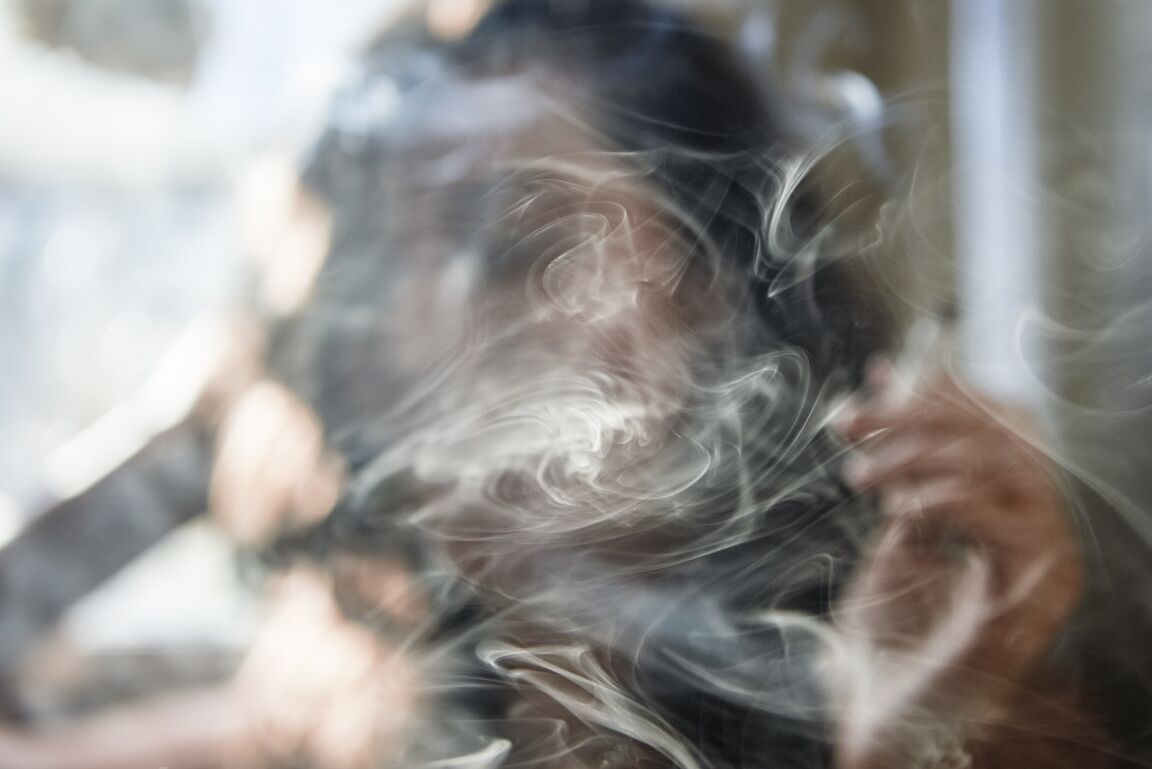 21P Amateur babe Nikki Silver smokes a spliff while posing naked indoors and out