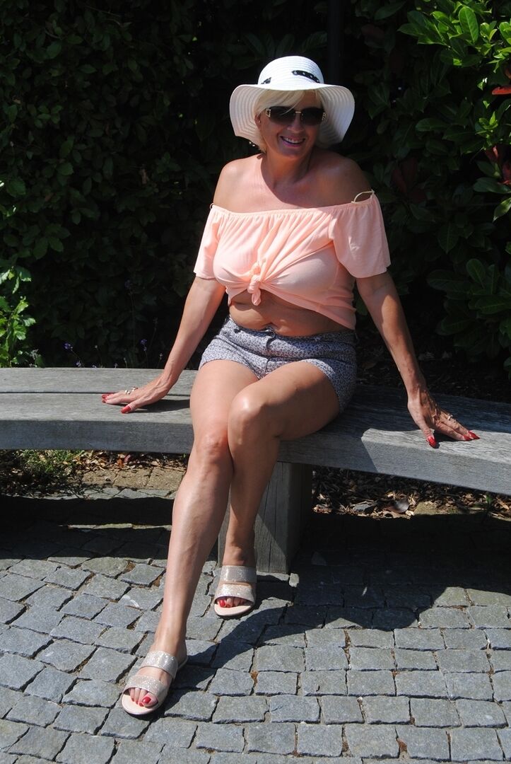 20P Older platinum blonde goes for a swim before showing her boobs by the road
