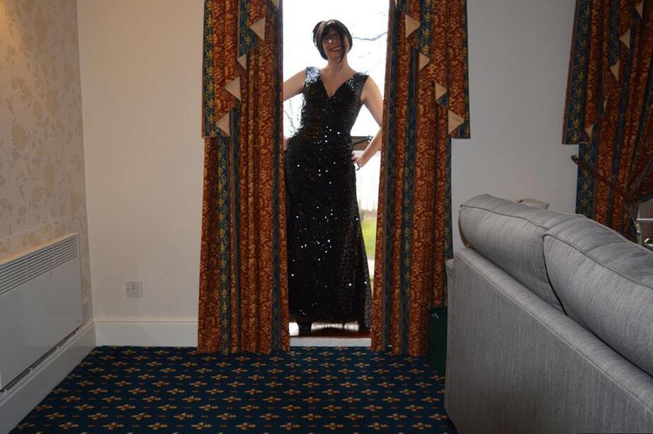 20P Over 30 amateur Barby Slut slips off a long gown to pose nude in nylons