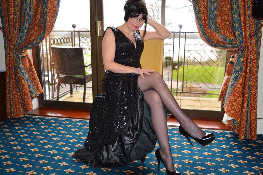 20P Over 30 amateur Barby Slut slips off a long gown to pose nude in nylons