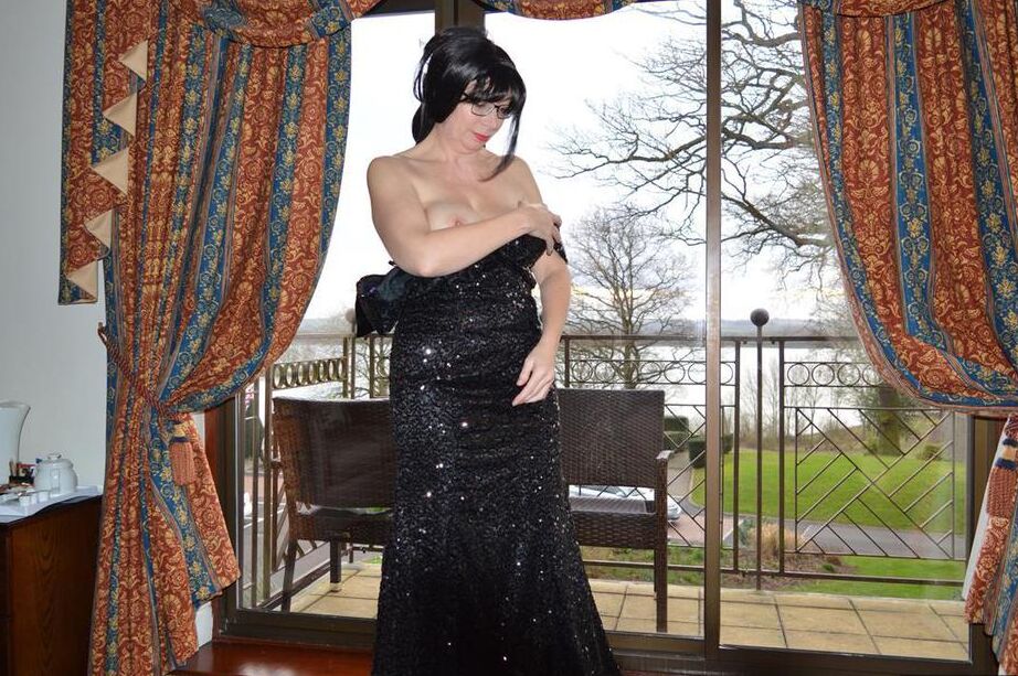 20P Over 30 amateur Barby Slut slips off a long gown to pose nude in nylons