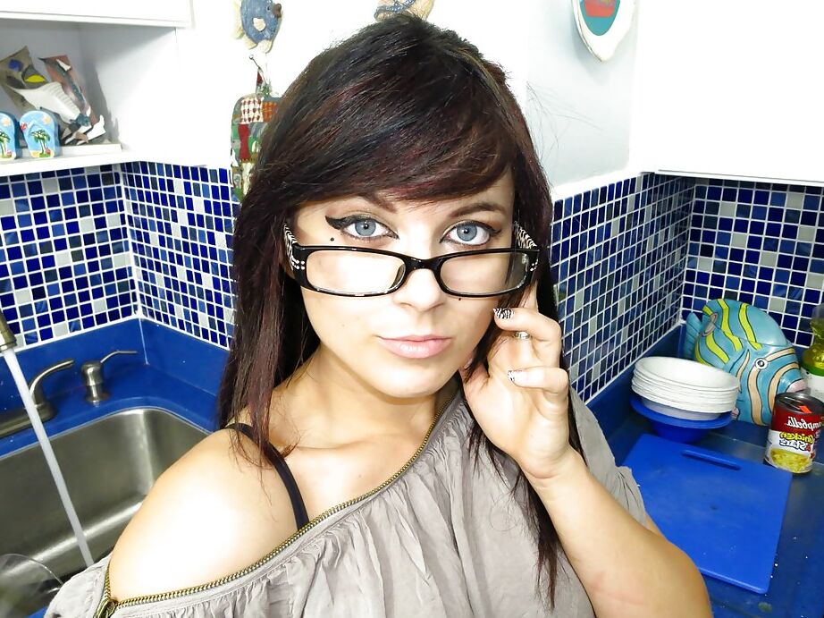 16P Smiley teenage fox in glasses slowly uncovering her seductive curves