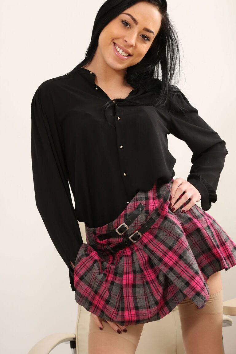 21P Black haired cutie Layla May drops her plaid uniform and teases in lingerie