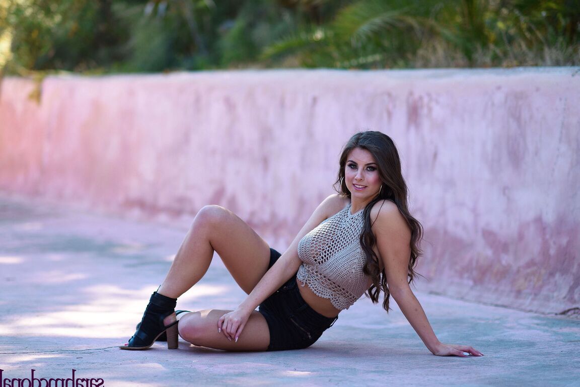 16P Glamorous shorts clad Sarah Mcdonald bares her big tatas in the tropical sun