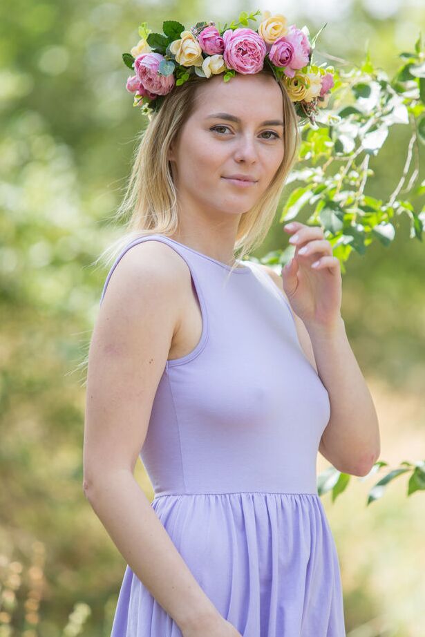 16P Susana Gil flaunts her smooth, milky body as she poses on the grass