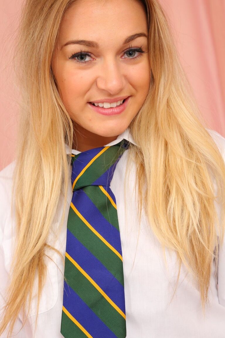 21P Gorgeous Kay Taylor strips off uniform and poses in white panties and socks