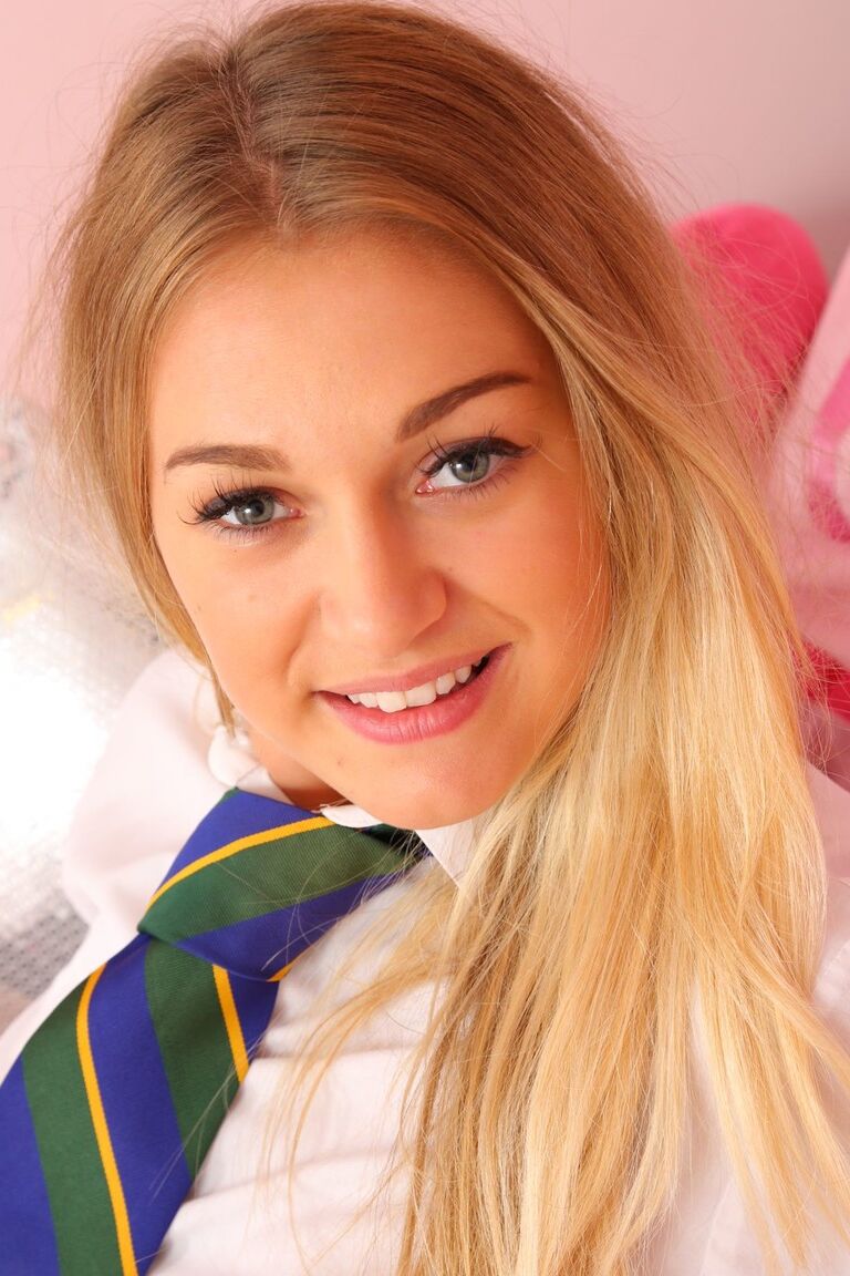 21P Gorgeous Kay Taylor strips off uniform and poses in white panties and socks