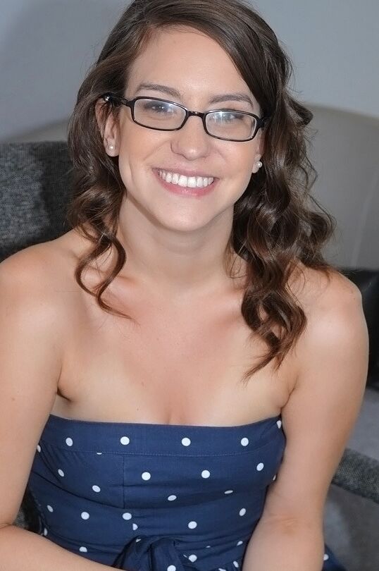 12P Amateur chick in glasses Alexa Amore shows tiny tits and spreads slim legs