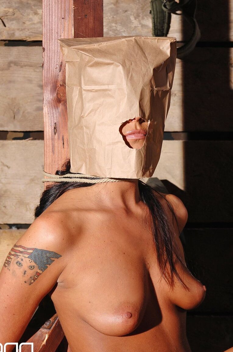 21P Military babe Simony Diamond gets a doggystyle pounding while in bondage