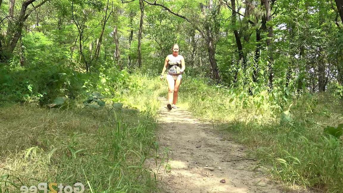 15P Blonde babe Licky Lex squats to pee in the woods