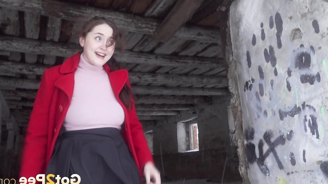 15P Dark haired hottie stands to piss in a doorway