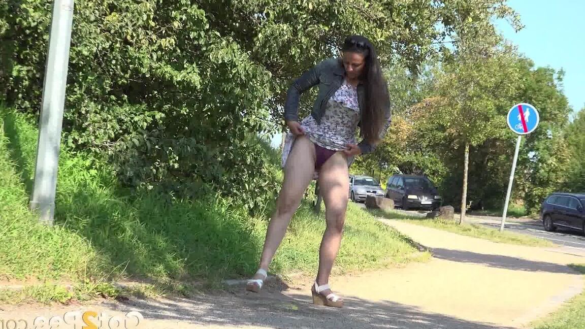15P Valentina Ross enjoys a public pee on a path