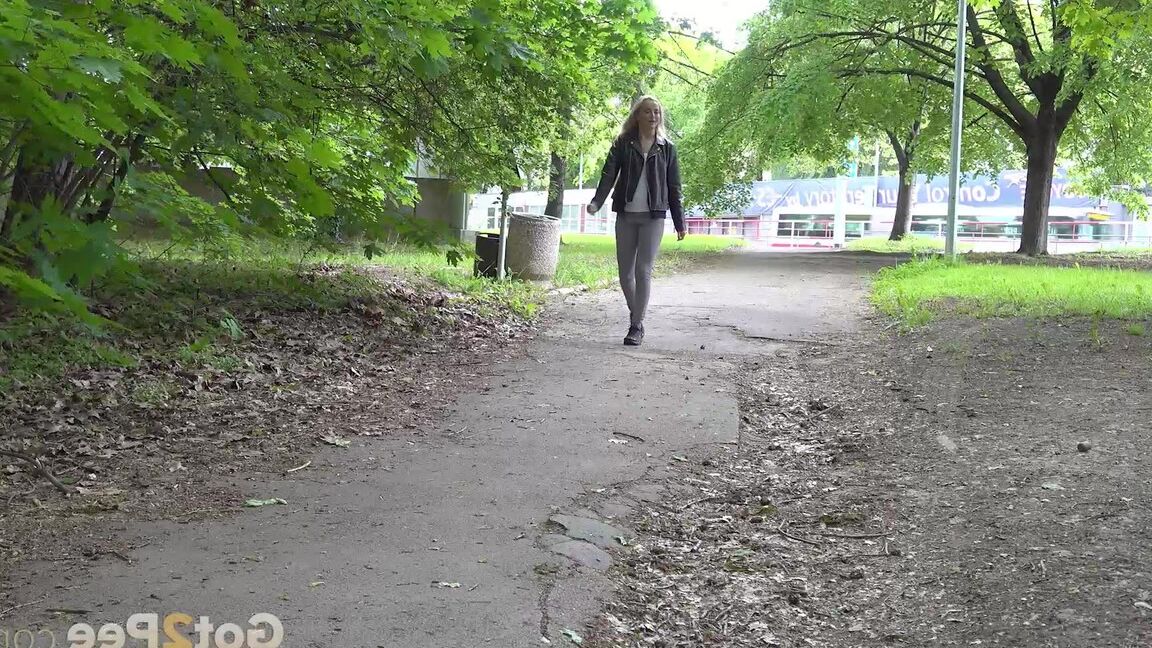 15P Victoria Pure squats to piss on a path in the city