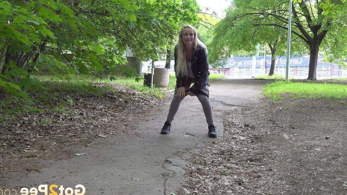 15P Victoria Pure squats to piss on a path in the city