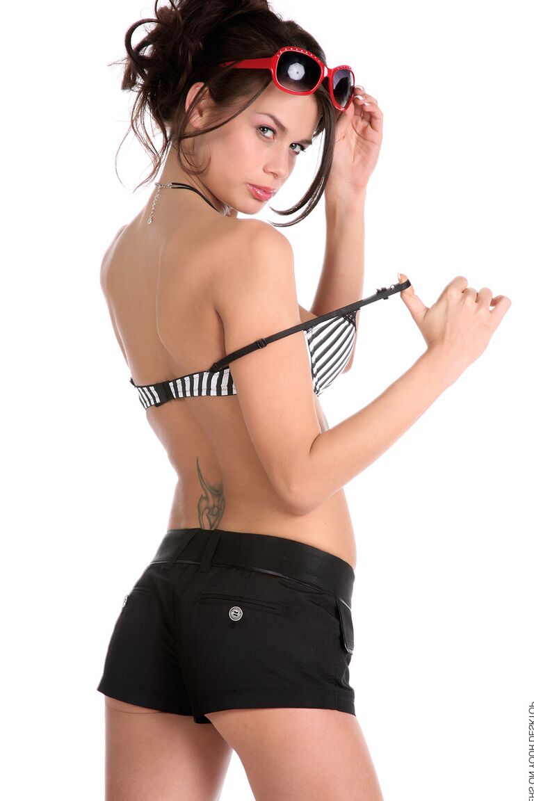 15P Gorgeous brunette Marie draws attention to her tight slit after undressing