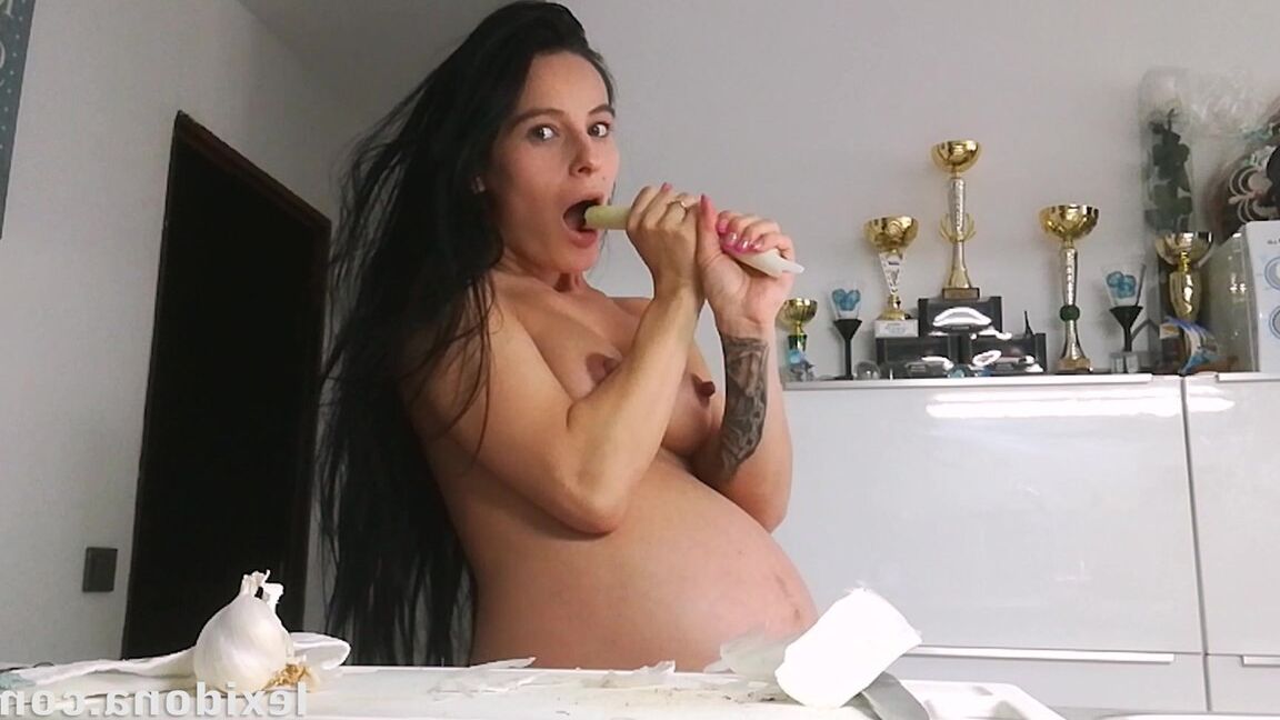 15P Horny and pregnant Lexi Dona undressing in the kitchen to sate her appetite