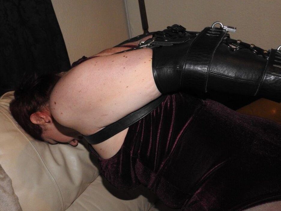 16P Natural redhead is placed in a straight jacket with her glasses on
