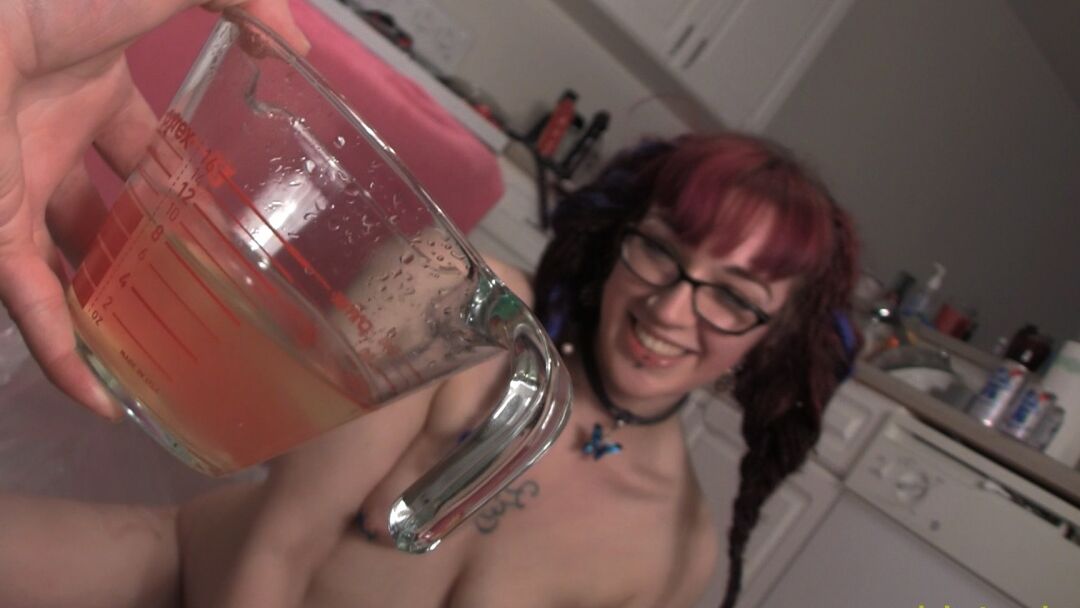15P Ruby enjoys a big gulp of a bowl of hot pee