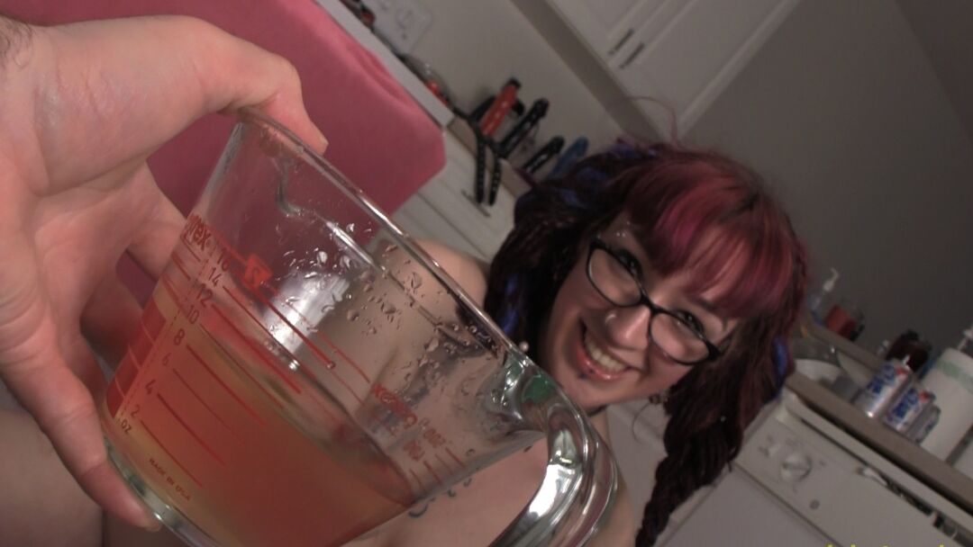 15P Ruby enjoys a big gulp of a bowl of hot pee