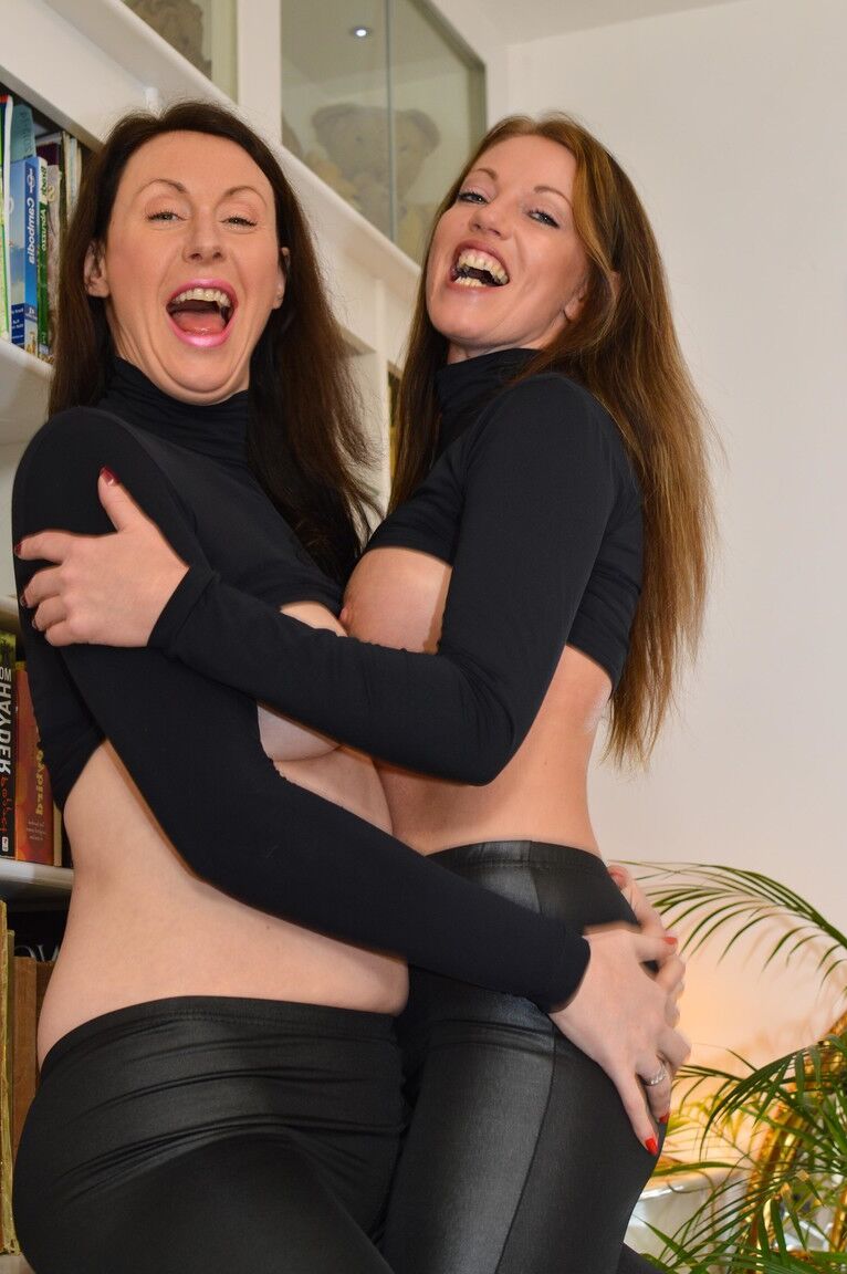 17P Middle-aged dykes attired in matching outfits get down to eating pussy