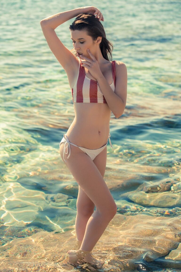 10P Cyprian babe in bikini Serena Wood posing on the rock by the sea