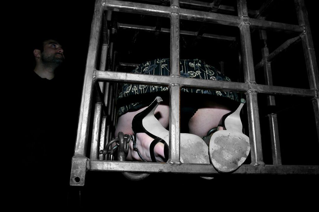 17P Redhead slave Arachnia Webb gets tortured while sitting in the cage