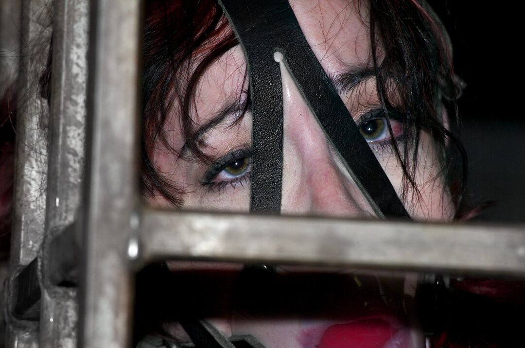 17P Redhead slave Arachnia Webb gets tortured while sitting in the cage