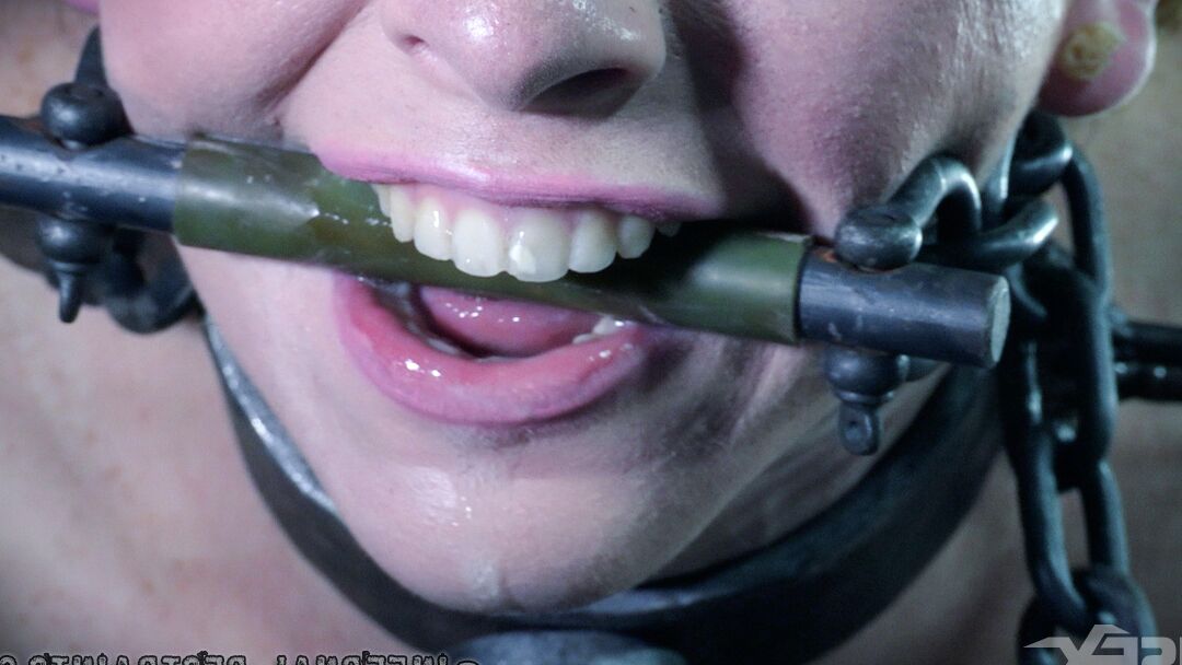 14P Skinny white girl Katy Kiss find herself restrained in a dungeon