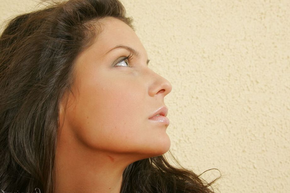 16P 18-year-old brunette Isabella blows a kiss while modelling in the nude