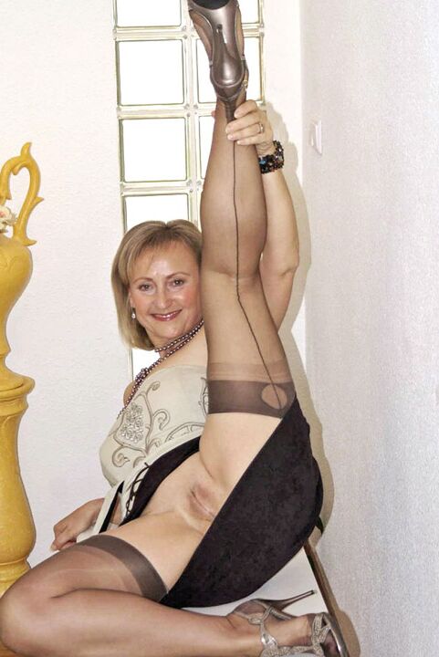 12P Mature fatty in high heels strips down to her stockings and masturbating fiercely