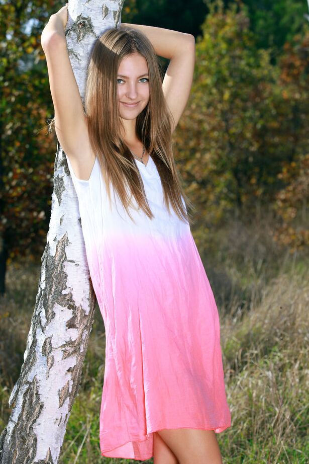 18P Teen solo Izabel A gets naked on a blanket up against a tree