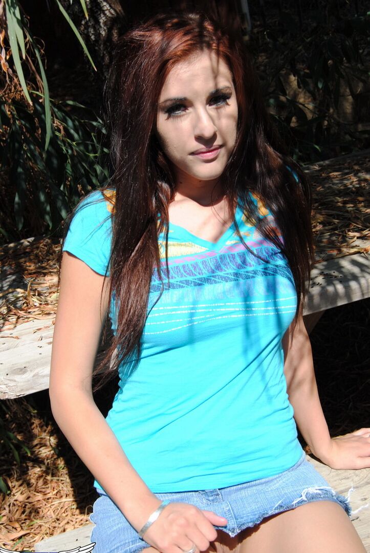 12P Young brunette Tabitha uncovers her firm tits before showing her bald slit