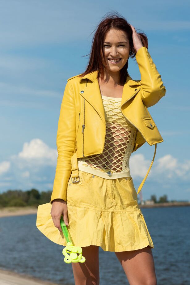 18P Sweet teen Mina divests herself of clothing to get naked by the ocean