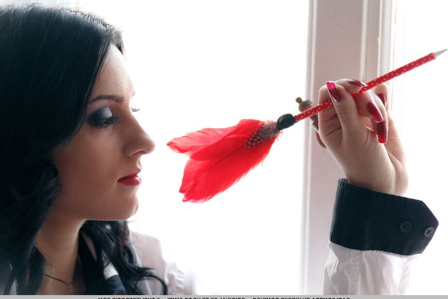 16P Dark-haired 18 year old Gabi Sombra teases her body with a feather