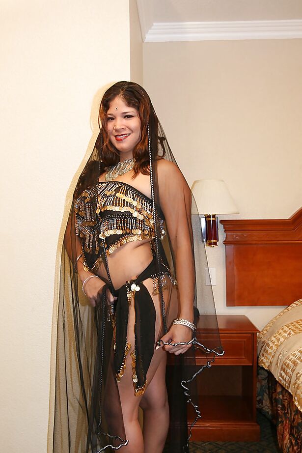16P Chubby indian lady with ample ass stripping and spreading her legs