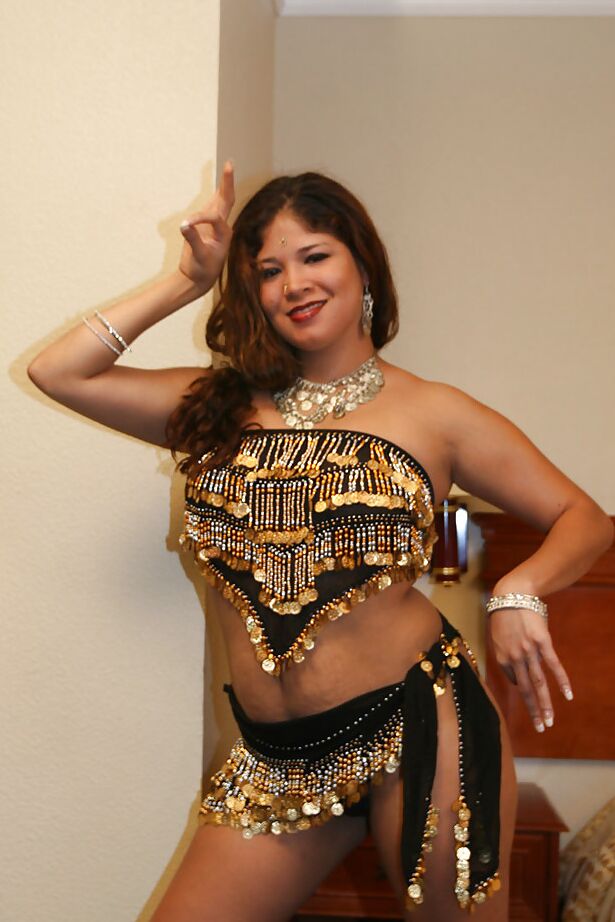 16P Chubby indian lady with ample ass stripping and spreading her legs