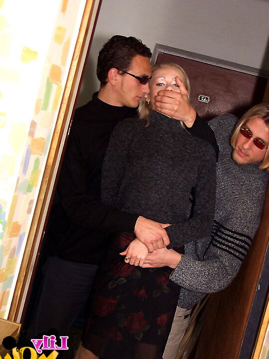 11P Blonde girl is subdued by two men before they take turns fucking her