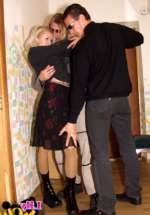 11P Blonde girl is subdued by two men before they take turns fucking her